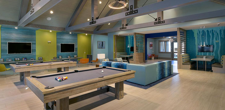 Interior lounge with pool tables and tvs