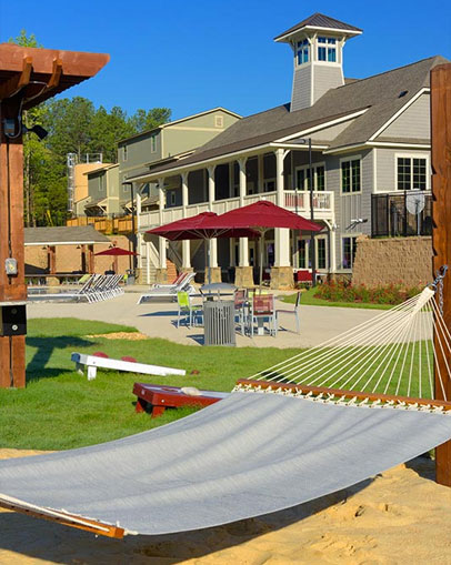 Green space area with hammocks and lounge seating