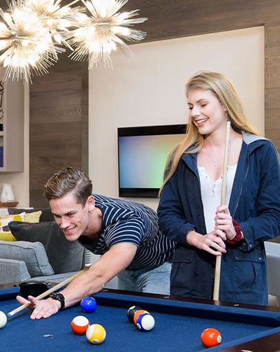 Residents playing pool together