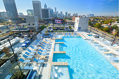 Resort-style pool with plenty of pool side seating