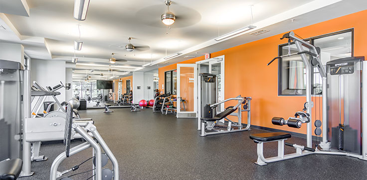 Campus View Apartments Fitness center with equipment