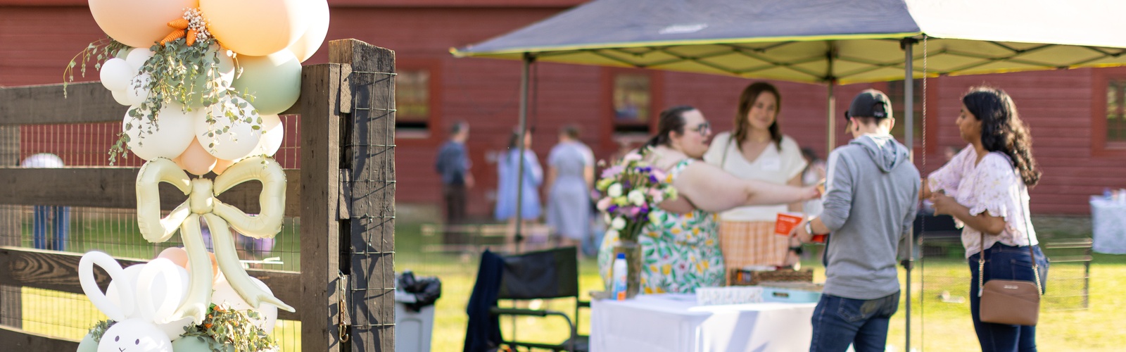 Man and woman visiting a stand at event